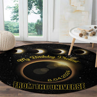 Black round eclipse birthday carpet featuring 'From the Universe' and 8.04.2024