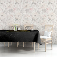 Black tablecloth with solar eclipse gold-ring graphic and birthday message on table