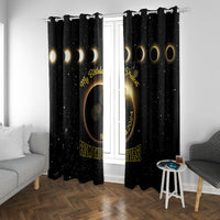 Black eclipse-themed curtains with gold moon-phase rings and text, hanging symmetrically