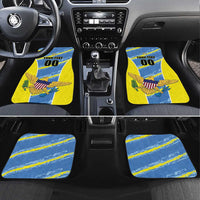 Blue and yellow car floor mats with eagle graphic and 'YOUR TEXT 00' insert.