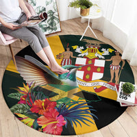 Round tropical area rug, black with hummingbird, red flowers, dancers and animals
