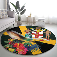 Round tropical area rug with hummingbird, hibiscus flowers, and patterned center panel