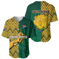 Two South Africa baseball jerseys, green and yellow zigzag with protea and springbok graphics.
