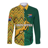 Long sleeve button shirt, yellow and green tribal pattern with springbok graphic and flag badge