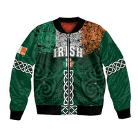 Green bomber jacket with IRISH text, shamrock knotwork, orange and black sleeves