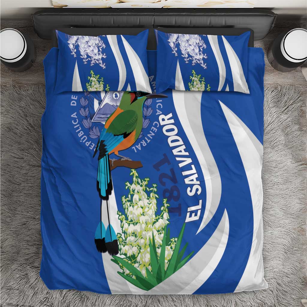 Blue bedding set: duvet with El Salvador crest text ring, bird illustration, matching pillowcases