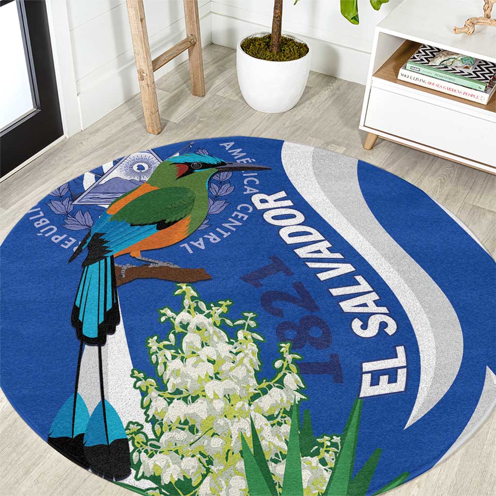 Round blue decorative carpet with bird and flower graphics, circular white accents