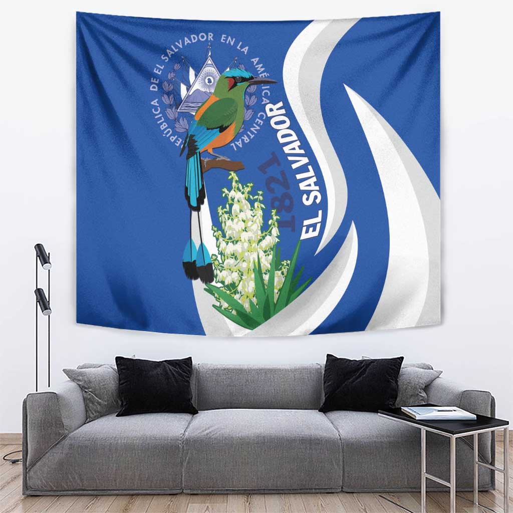 Blue wall tapestry with El Salvador crest, colorful bird, and white izote flowers