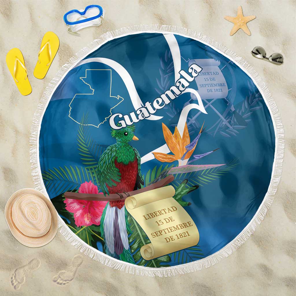 Blue round beach blanket with white fringe, Guatemala map, quetzal and flowers print