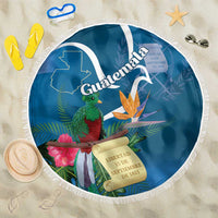 Blue round beach blanket with white fringe, Guatemala map, quetzal and flowers print
