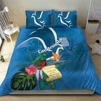 Blue tropical duvet bedding set with two pillows and Guatemala crest, quetzal, flowers