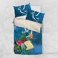 Blue bedding set with duvet and two pillows, quetzal and tropical flower artwork