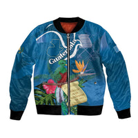 Blue bomber jacket with front zip, tropical quetzal and floral print, ribbed cuffs/hem