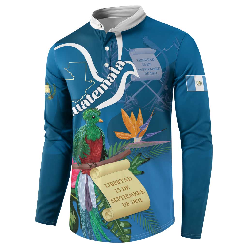 Blue henley sweatshirt with white collar and tropical bird, flower, and scroll graphic