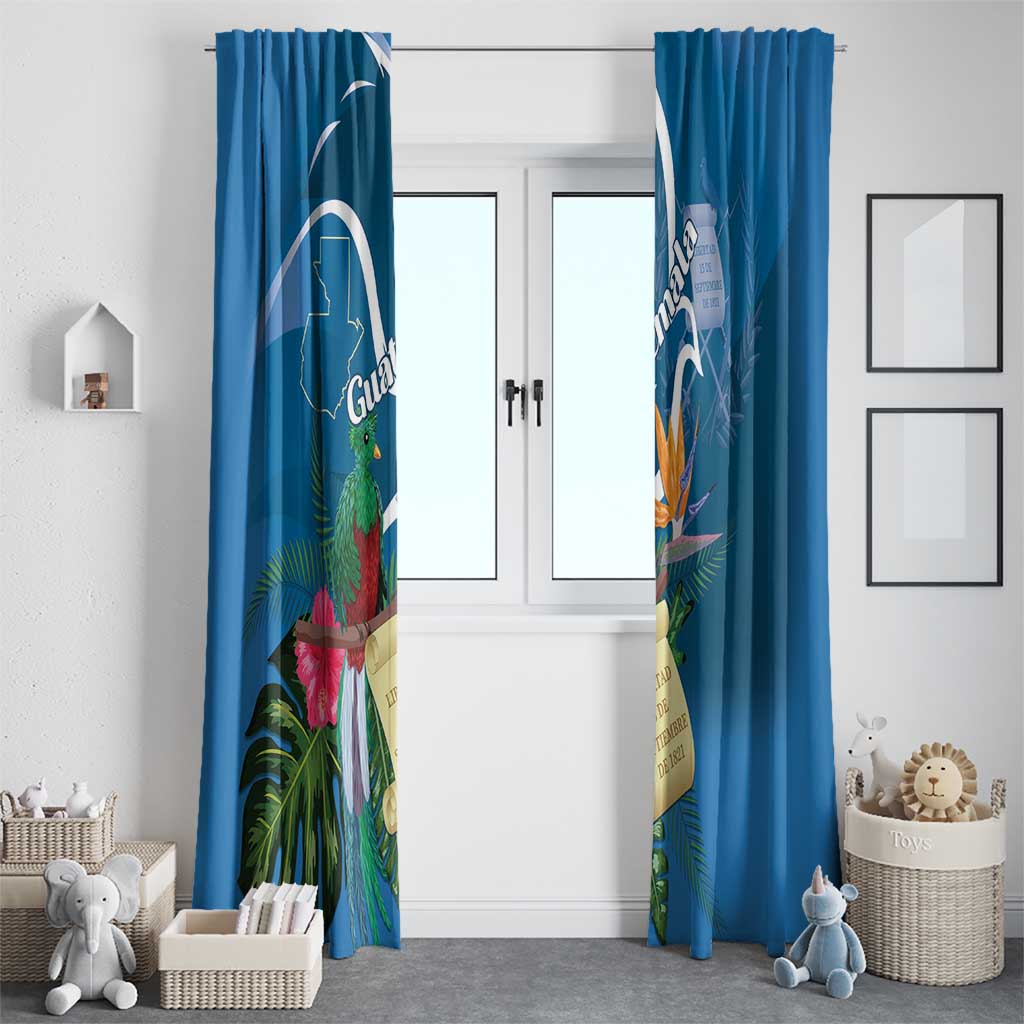 Blue pair of window curtains with quetzal, tropical flowers, and Guatemala-themed graphics