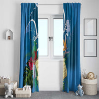 Blue pair of window curtains with quetzal, tropical flowers, and Guatemala-themed graphics