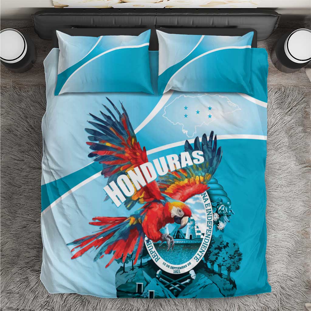 Sky blue duvet and pillowcases featuring Honduras crest with scarlet macaw artwork