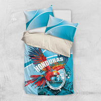 Sky blue bedding set with Honduras crest and scarlet macaw print, duvet and pillowcases