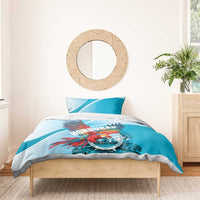 Sky blue duvet and pillowcase featuring Honduras crest and scarlet macaw artwork