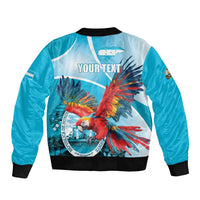Unisex sky blue bomber jacket with black ribbed hem and back macaw art, 'YOUR TEXT'