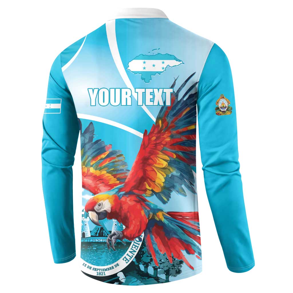 Blue long-sleeve button sweatshirt with large back parrot graphic and small sleeve crest