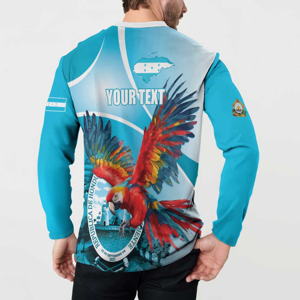 Blue long-sleeve button sweatshirt with colorful parrot graphic on back and white collar