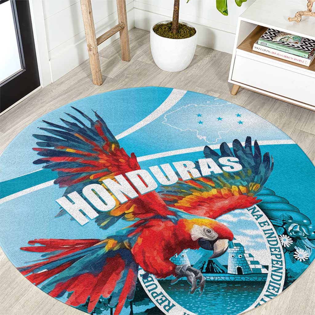 Round blue area rug with colorful scarlet macaw and “HONDURAS” text graphic