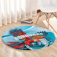 Round blue area rug with macaw illustration and “HONDURAS” text on a circular design