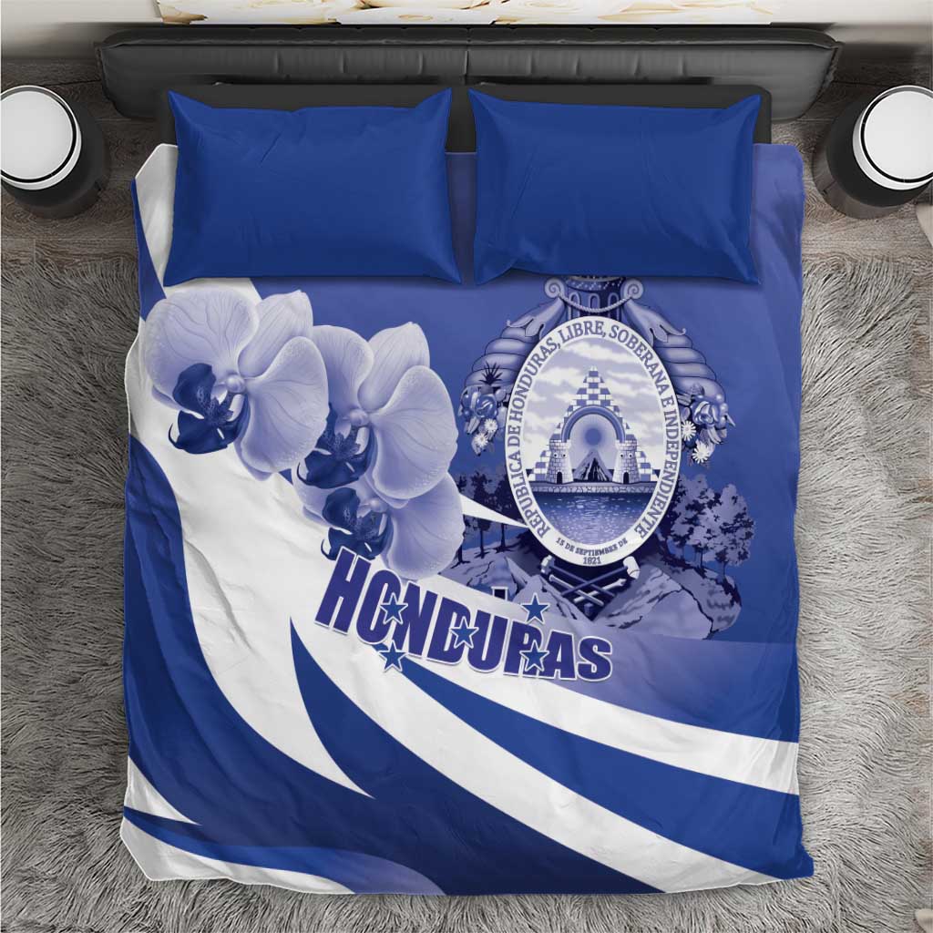 Blue and white duvet cover with Honduras coat of arms and orchid print, with matching pillows