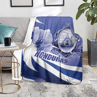 Honduras blanket with blue orchid flowers, white diagonal stripes, and circular coat of arms emblem