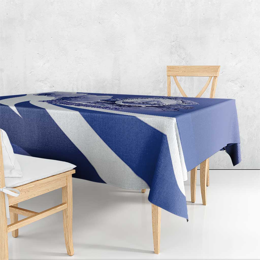 Navy blue tablecloth with white diagonal stripes draped over a dining table
