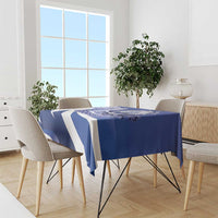 Navy blue tablecloth with white diagonal stripes and Honduras coat of arms