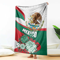 Mexico-themed blanket corner view with white patterned top, eagle crest, and MEXICO