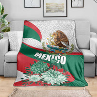 Mexico-themed blanket with eagle crest, MEXICO text, and big teal-white flowers