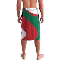 Printed wrap skirt with diagonal green and red panels, white accents, and flower print