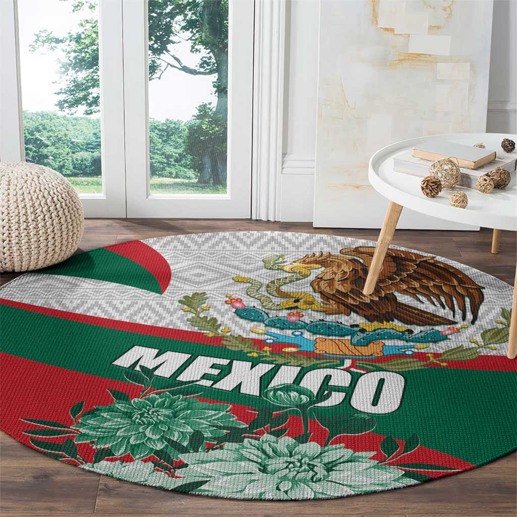 Round Mexican rug with eagle and “MEXICO” text across a red-green stripe band