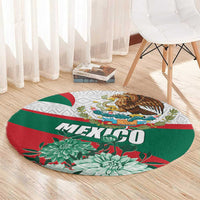 Round Mexican-themed rug with “MEXICO” wordmark, eagle design, and teal floral accents