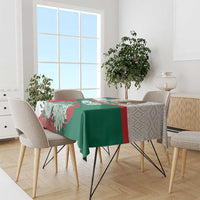 Dining tablecloth with green center, red stripe, and colorful floral eagle design