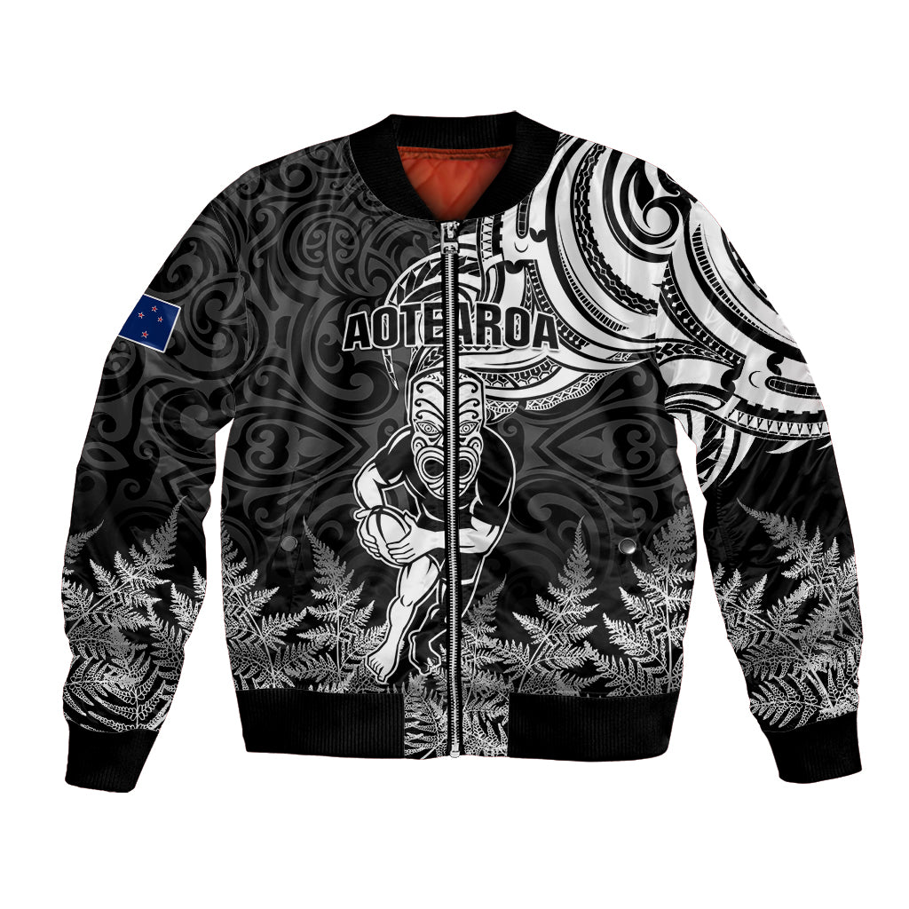 Black bomber jacket with full-zip front and Maori-style Aotearoa tribal artwork