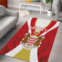 Red, white and gold area rug with Monaco crest and two cartoon figures at center