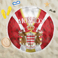 Red and white Monaco beach blanket with crest, round pattern, white fringed edge