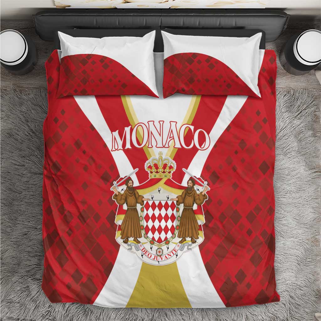 Red bedding set on bed: duvet with Monaco crest and two white-backed pillowcases