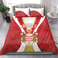 Red bedding set with Monaco crest graphic on duvet and two matching pillowcases