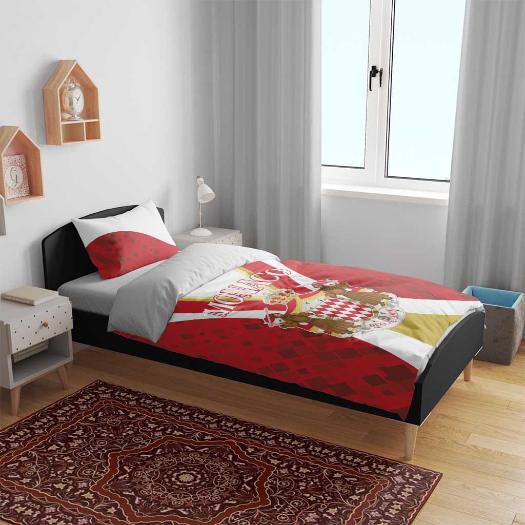 Red bedding set with Monaco crest and striped duvet, shown on a single bed