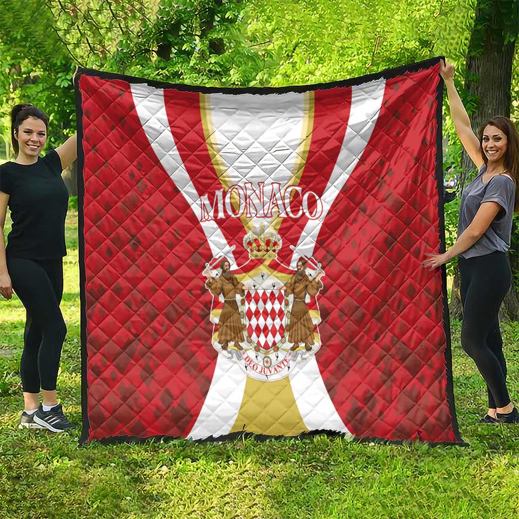 Red Monaco quilt with white and gold center stripe and crest medallion, quilted pattern