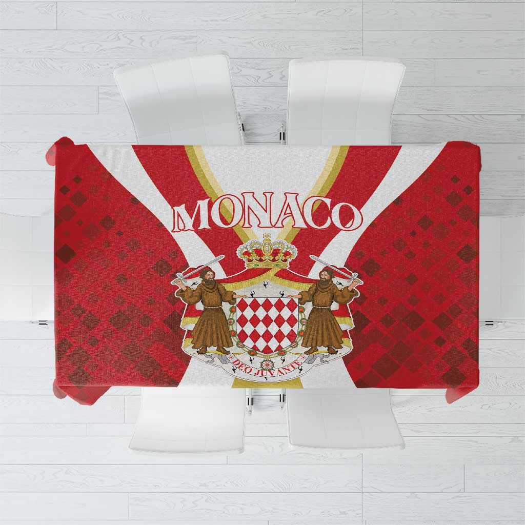 Red tablecloth with Monaco crest graphic and diamond-pattern border, square shape