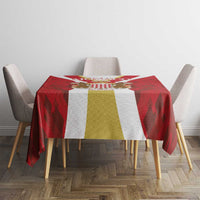 Red tablecloth with gold center stripe and white side panels, geometric print