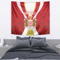Red Monaco wall tapestry featuring crown, MONACO lettering, and two robed figures