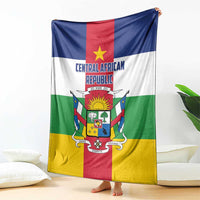 Central African Republic flag-style blanket hanging, showing central coat of arms and text