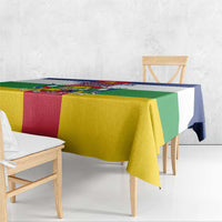 Flag-style tablecloth draped over table with yellow, green, red and blue edge